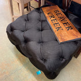 TUFTED HIDE OTTOMAN BLACK